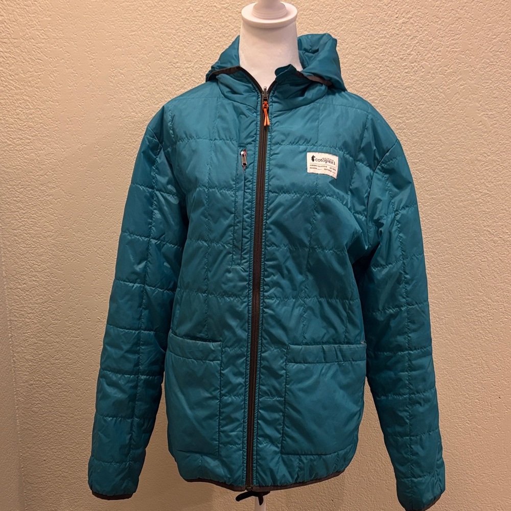 Cotopaxi woman’s reversible Aqua Puffer Jacket